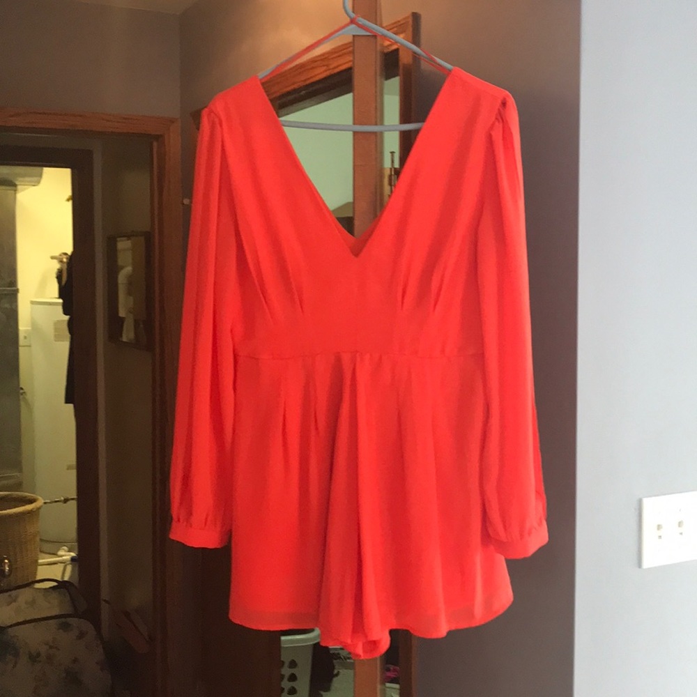 Orange romper.